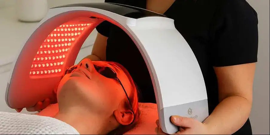 Professional using LED device in clinic/salon