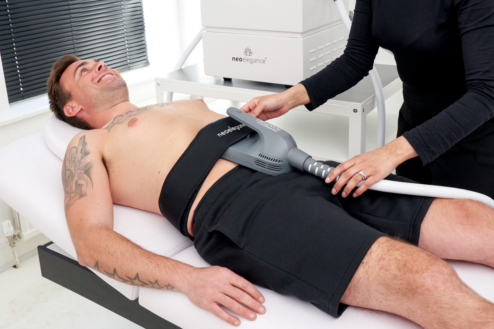 Neo Body SculptPro From Neo Elegance in use for Tummy Tightening in a clinic