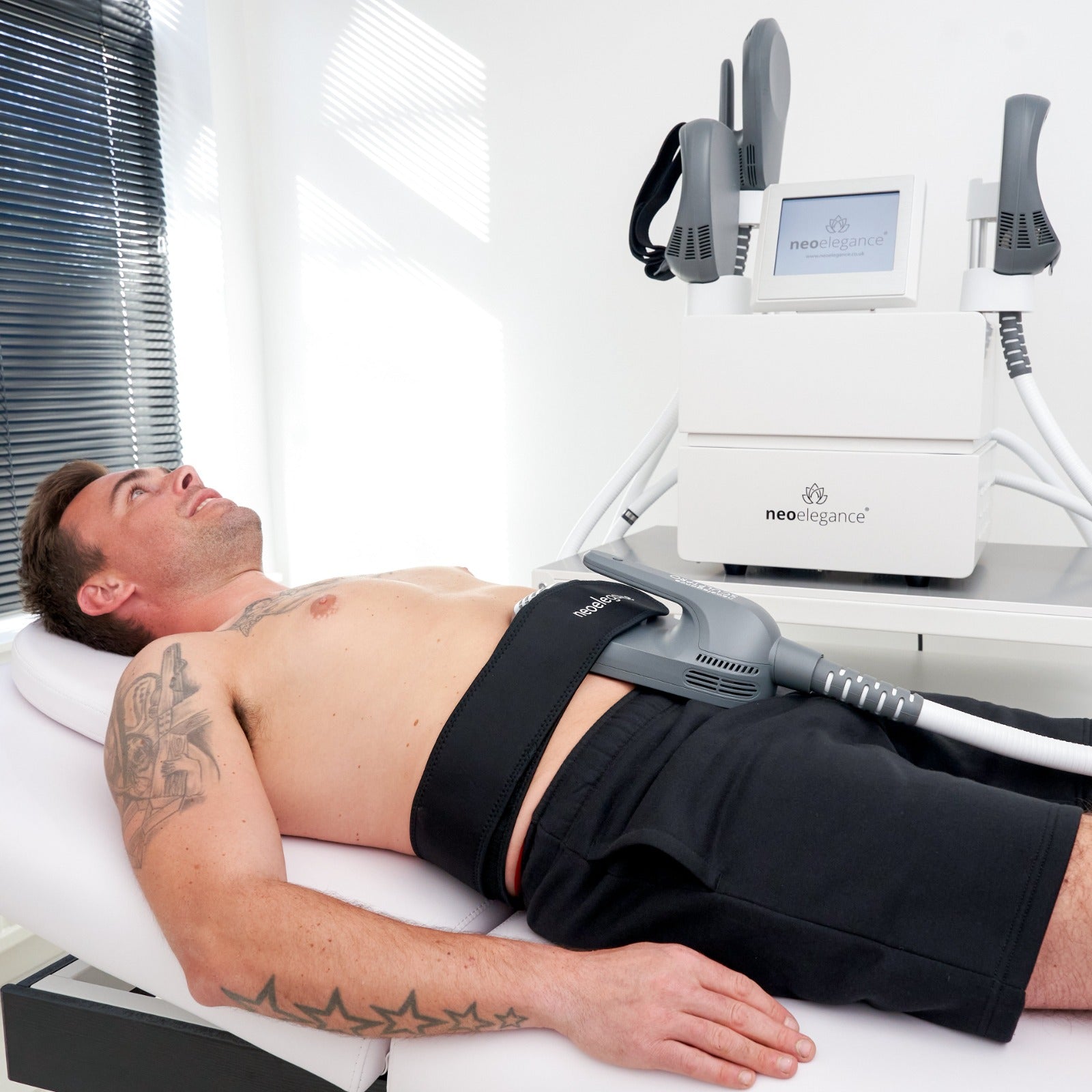 Neo Body SculptPro From Neo Elegance in use for Tummy Tightening in a clinic