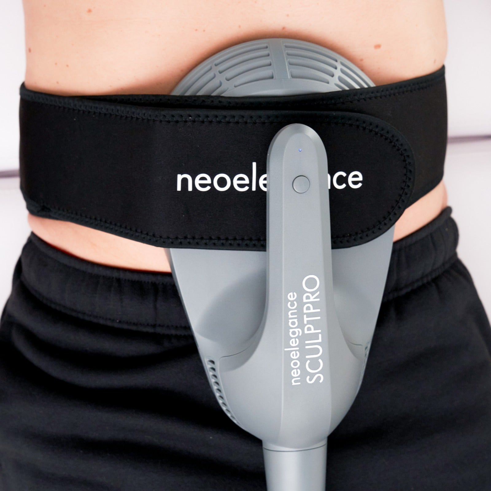 Neo Body SculptPro From Neo Elegance in use for Tummy Tightening in a clinic