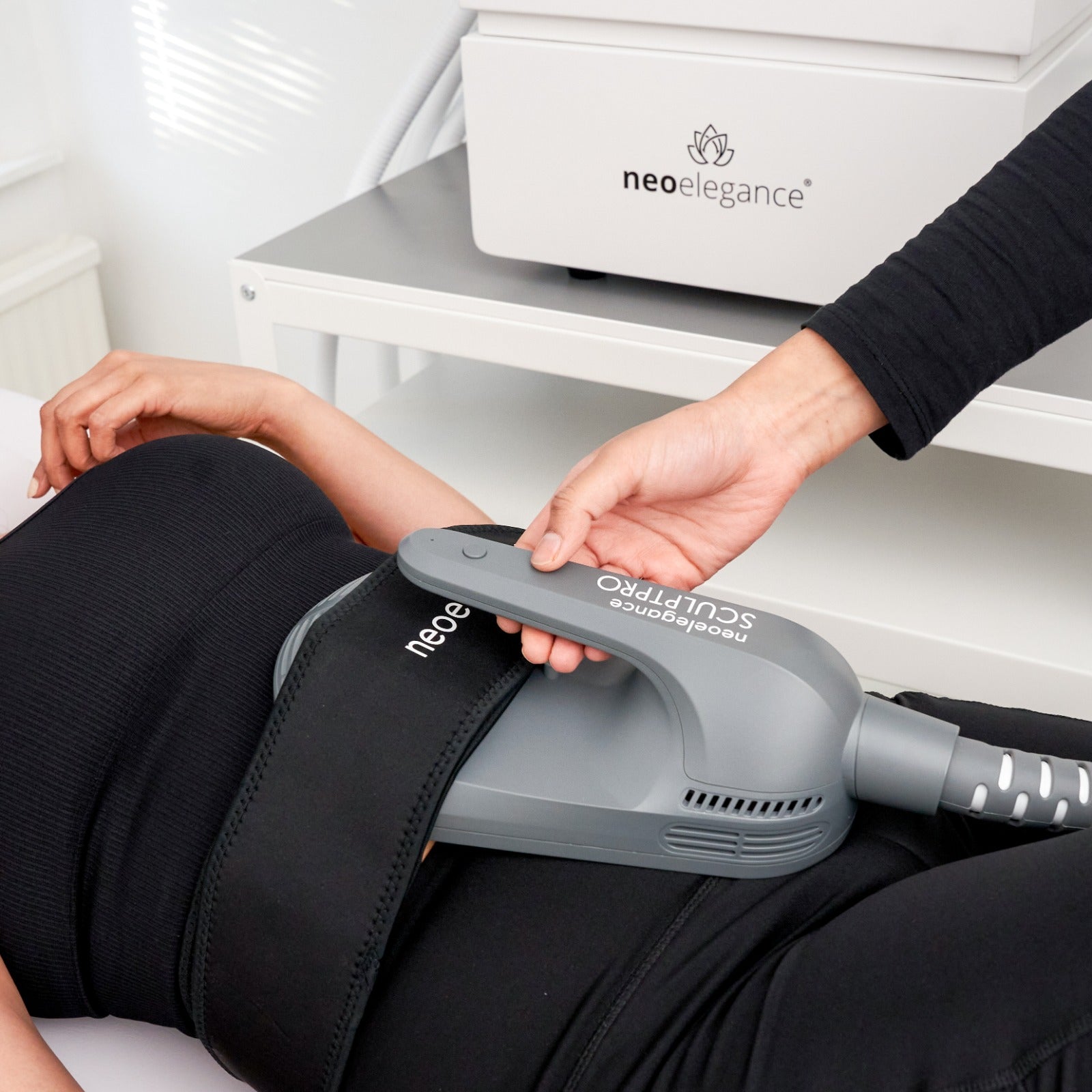 Neo Body SculptPro From Neo Elegance in use for Tummy Tightening in a clinic